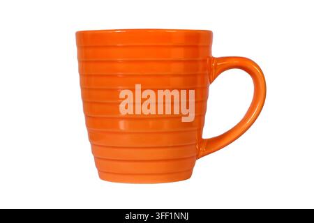 Orange ceramic cup isolated on white background. Porcelain cup close-up Stock Photo
