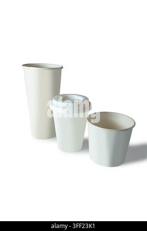 Three white and beige paper coffee cups in various sizes, one with a lid, isolated on a white background. Mockup or Copyspace Stock Photo