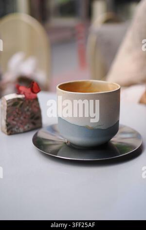 Cup of coffee on a table in a cafe Stock Photo