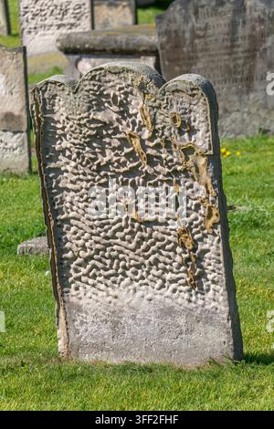 Weathered gravestone in Tynemouth churchyard Stock Photo