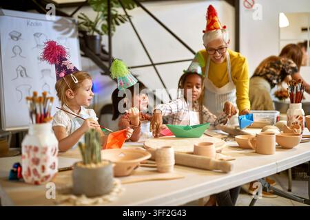 happy kids painting  on a creative birthday party.  Creative, hobby ,workshop  concept Stock Photo