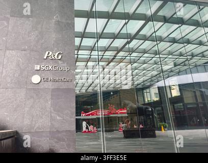 the exterior facade and glass lobby entrance of The Metropolis office building located at 9 North Buona Vista Drive in Singapore Stock Photo