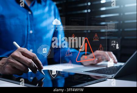 AI cybersecurity system warning interface with IT professional using laptop and tablet to monitor AI, cloud data and network threats. digital security Stock Photo