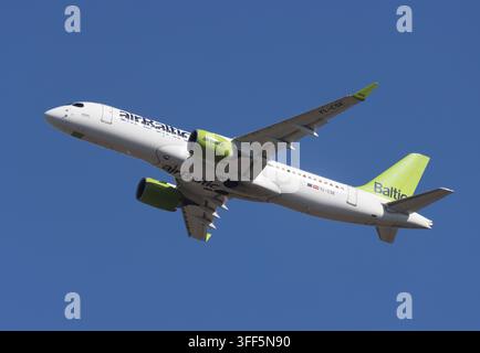 An Airbus A220-300 of Air Baltic departs London Gatwick Stock Photo
