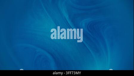 Defocused glitter paint. Blue splash pigment. Vibrant color bright texture water particles fluid spill on abstract art background. Stock Photo