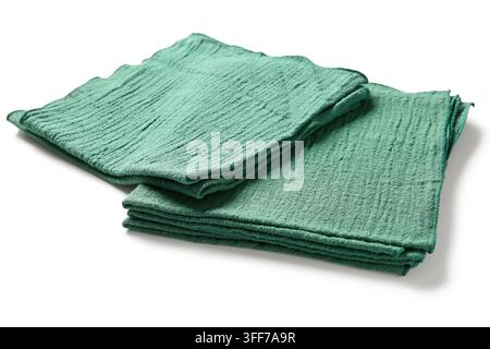 Home decor and interior design, green muslin napkins for table setting and dining, eco friendly textile and sustainable kitchen linen on white backgro Stock Photo