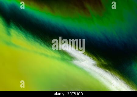 Dark green fluid texture with luminous lime highlights for music, nightlife, fantasy, gaming and emotional visual  Stock Photo
