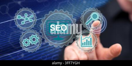 Man touching a seo concept on a touch screen with his finger Stock Photo