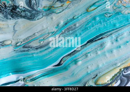 Bright cyan and white fluid paint wave texture featuring subtle liquid bubbles and soft gradients Stock Photo