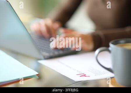 Close up portrait of an office worker hands using ai on laptop working online Stock Photo