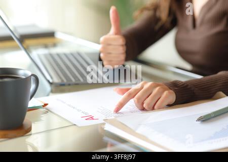 Close up portrait of an office worker using ai and gesturing thumb up Stock Photo
