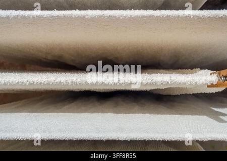 White Towels Air Drying Outdoors on a Clothesline Stock Photo