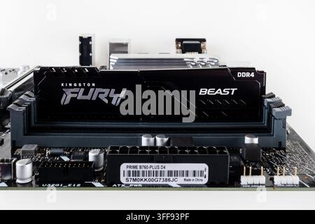 Maykop, Russia - February 18, 2025: installed the kingston fury ddr4 RAM module in the Asus motherboard socket close-up Stock Photo