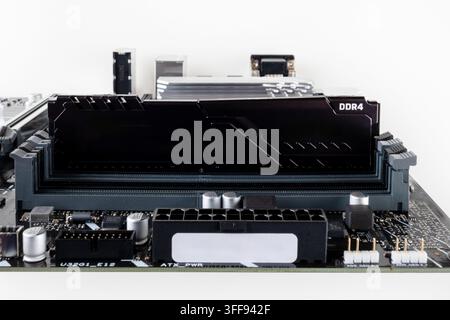 installed the ddr4 RAM module in the motherboard socket close-up Stock Photo