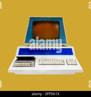 Vintage eighties desktop personal computer with crt display on an orange background Stock Photo