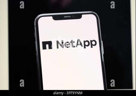 Paris, France - September 7, 2026: Smartphone displaying the NetApp corporate logo on a screen. Stock Photo