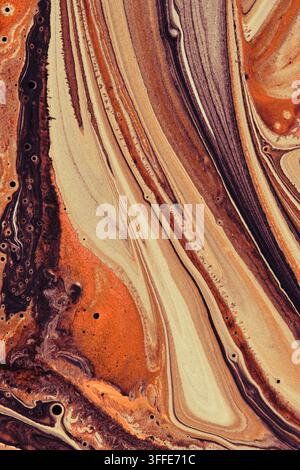 Vertical abstract liquid paint texture featuring warm orange, beige, and deep brown marble swirls Stock Photo