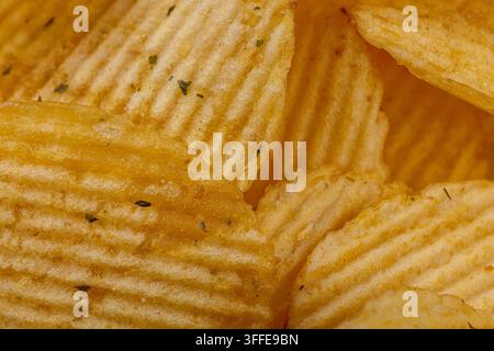 Lots of potato chips, texture close up Stock Photo