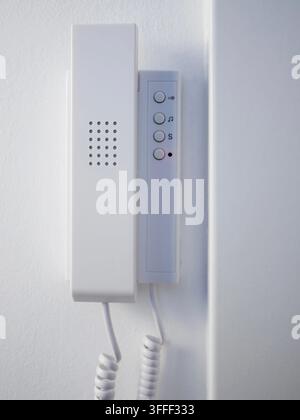 Wall-Mounted Intercom - Modern Apartment Communication and Security Concept. Stock Photo