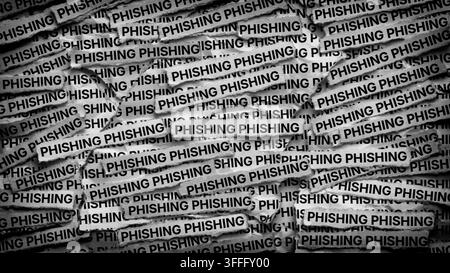 Strips of newspaper with the words Phishing typed on them. Black and white. Close up. Stock Photo