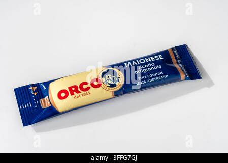 Italy - September 6, 2026: single-serving blue packet of Italian Orco mayonnaise sauce, gluten free and without thickeners, on a plain white surface. Stock Photo
