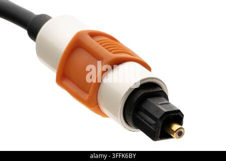 Close-up view of a TOSLINK optical audio cable head with gold-plated metal connector for high-fidelity digital sound transmission. Stock Photo