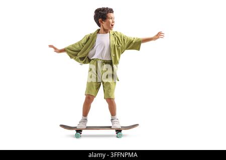Boy balancing on a skateboard isolated on white background Stock Photo