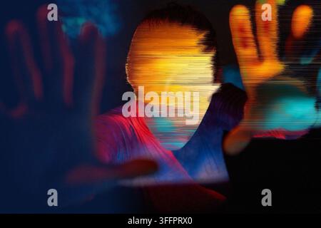 Futuristic woman interacts with a glowing hologram in cyberspace, surrounded by vivid digital distortion and neon light, illustrating virtual reality, Stock Photo