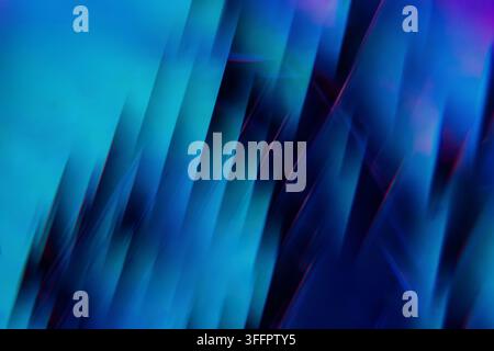 Abstract composition of luminous blue, cyan, and violet light streaks with diagonal motion blur, creating a sleek futuristic background for technology Stock Photo