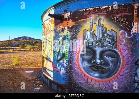 Graffiti Art on Abandoned Goldome Mill Tank in Mojave Desert California Stock Photo