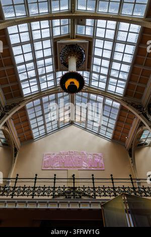 “Made in Birmingham” pink neon sign displayed inside Birmingham Museum and Art Gallery, celebrating the city’s creative identity, industrial heritage Stock Photo