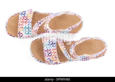 Top view flat lay of colorful summer sandals for women isolated on white background Stock Photo