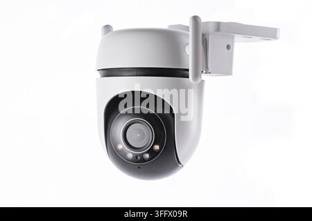 Modern white wireless outdoor PTZ security camera with dual antennas isolated on white background Stock Photo