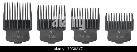 black hair clipper guards isolated white background, plastic trimmer attachments in different sizes from three to twelve millimeters Stock Photo