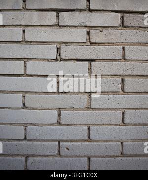 Texture of gray rectangular brick wall in full frame background Stock Photo