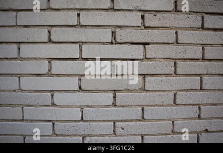 Texture of gray rectangular brick wall in full frame background Stock Photo