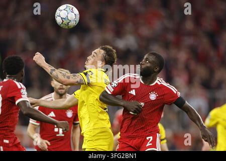 Header duel between Dayot Upamecano (FC Bayern Munich) and Igor ...