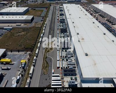 Aerial view of a large data center facility and cooling equipment Stock Photo