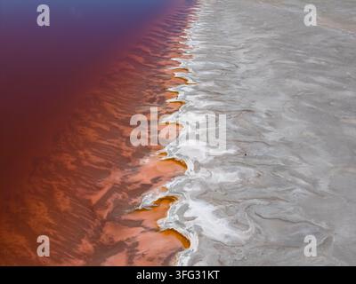 A drone view of the pink water at the Great Salt Lake in Utah Stock Photo