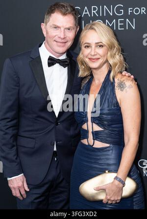 Bobby Flay and Brooke Williamson attend at The Pool, Seagram Building ...
