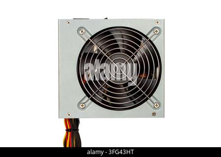 Computer power supply unit with cooling fan. Hardware component for desktop PC. Electronic device for energy distribution and system cooling. Stock Photo