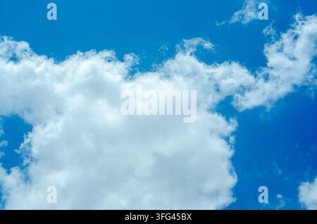Soft White Clouds Floating in Deep Blue Atmosphere Stock Photo