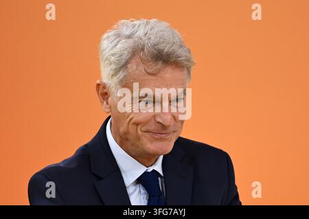Luc Adrien Jean Luc Melenchon take part in a protest against the rising cost of ...