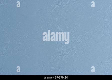 Full frame texture light blue leather or faux leather material with fine subtle embossed skin pattern Stock Photo