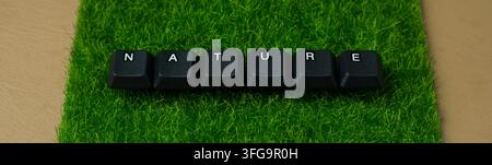 Nature Word Made From Keyboard Keys On Green Grass Stock Photo