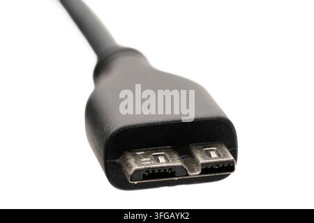 Close-up of a USB 3.0 Micro-B cable connector plug on a white background Stock Photo