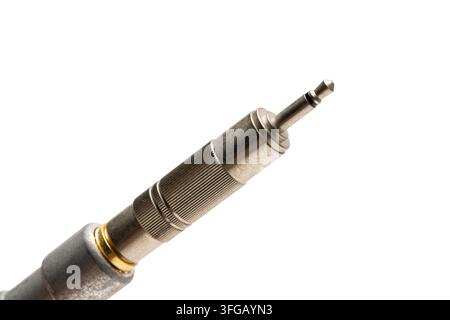 Close-up of a 3.5mm 1/8 inch mini audio jack plug on a white background Stock Photo