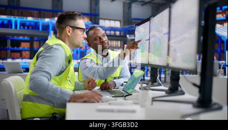 Logistics Coordinator Reviews Delivery Routes On Laptop For Efficient Shipment Planning. Stock Photo