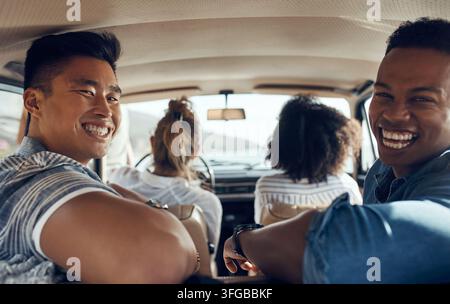 Men, happy and couple of friends on road trip with portrait, bonding and travel for vacation. People, laugh and group with carpool for holiday, inside Stock Photo