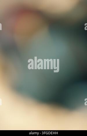 Abstract out of focus background with soft gradient light and subtle film grain texture Stock Photo